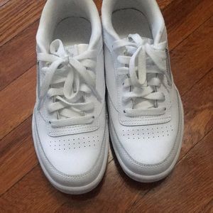 White Reebok sneakers